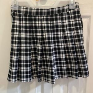 Beautiful school-style skirt with black and white tweezers designed by Joe B.